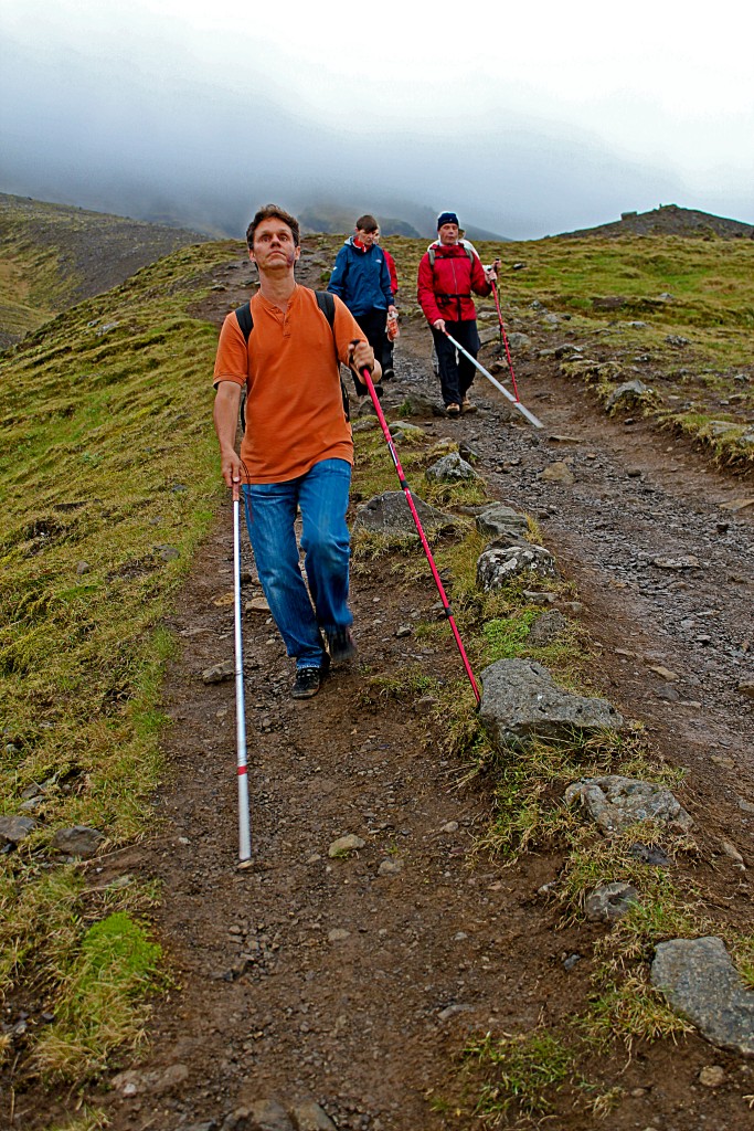World Access for the Blind Founder and President Daniel Kish leading hikers along a mountain pass. Photo provided by: Daniel Kish