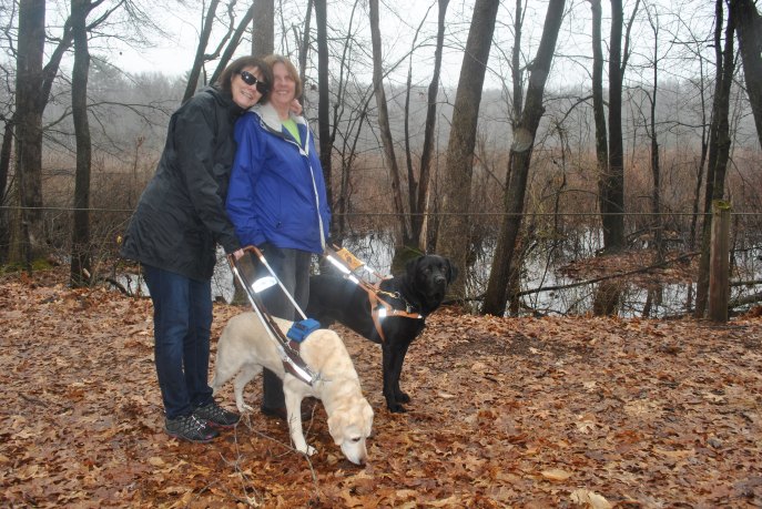 Maryanne Mellui and Beth Rival hit the trail with their dogs Aza and Finbarr Photo by Katherine Jurgens